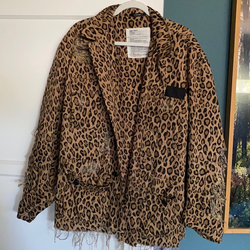 Leopard R13 oversized shredded denim jacket.